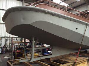 Exterior of the MV Ross Point sand blasted and primed by Hickman Engineering