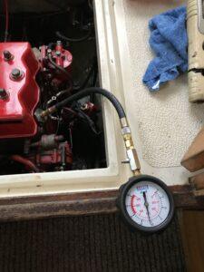 Compression tester running on a Beta Marine diesel engine