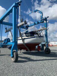 Swan Song Boat Repairs showing boat on a rig ready to be moved